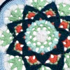 blue green floral round fan close up detail