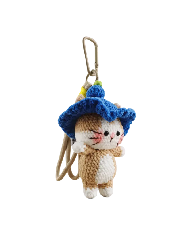 blue hat cat bag charm detail