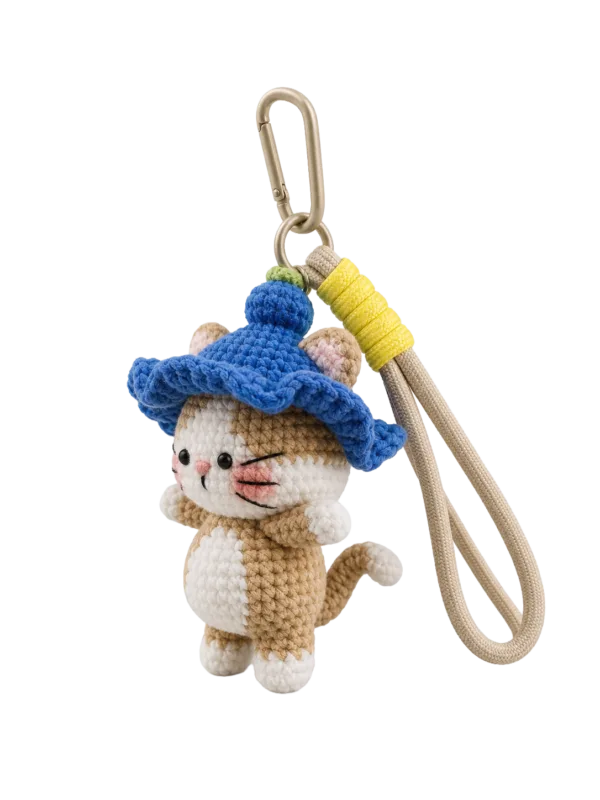 blue hat cat bag charm strap detail