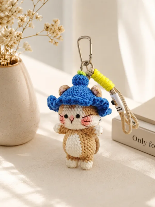 blue hat cat bag charm texture detail