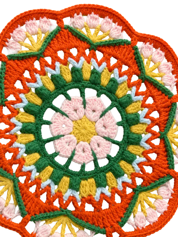 orange green floral round fan close up detail