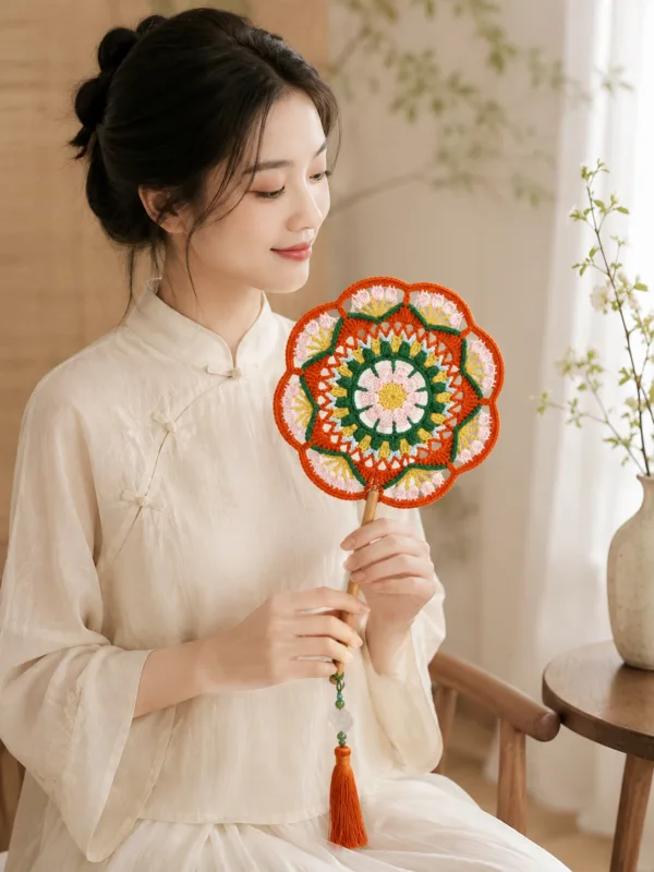 orange green floral round fan lifestyle scene