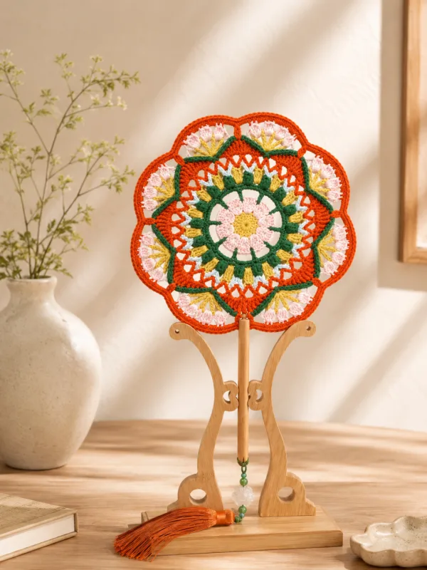 orange green floral round fan top view