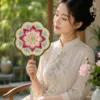 pink lotus floral round fan lifestyle scene