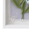 blue lily of the valley shadow box frame close up detail