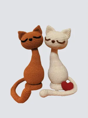 Hand crocheted couple cat dolls plain background main image