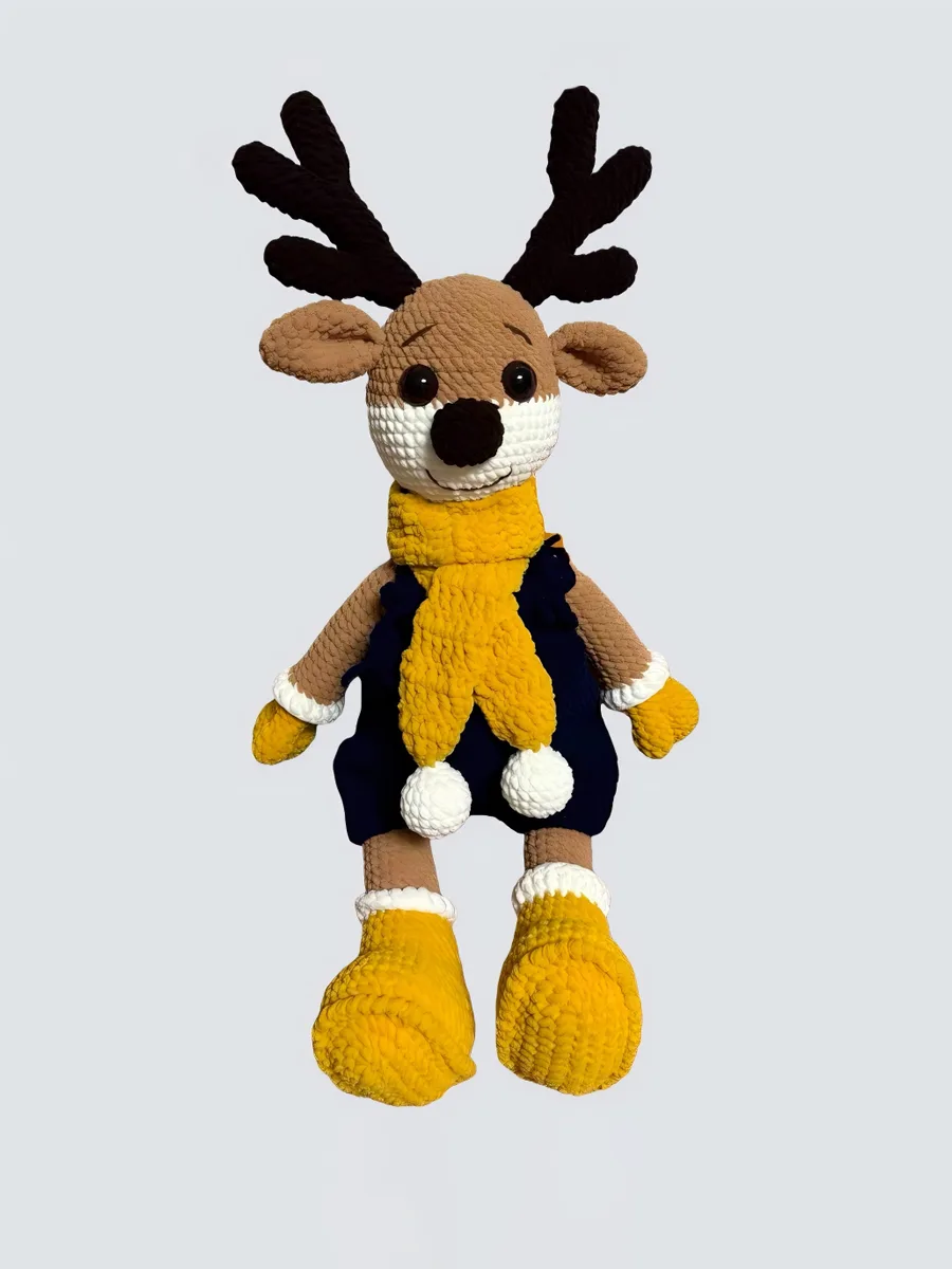 Hand crocheted reindeer doll yellow scarf