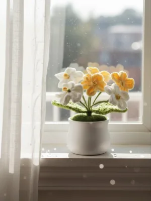 Hand crocheted yellow flower pot window sill decoration