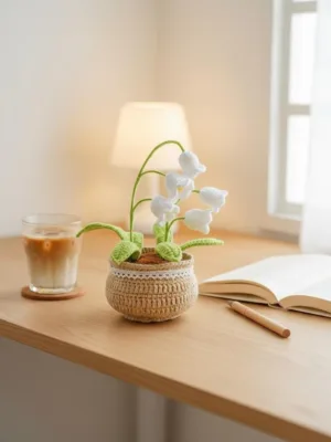 Crochet lily of the valley on desk