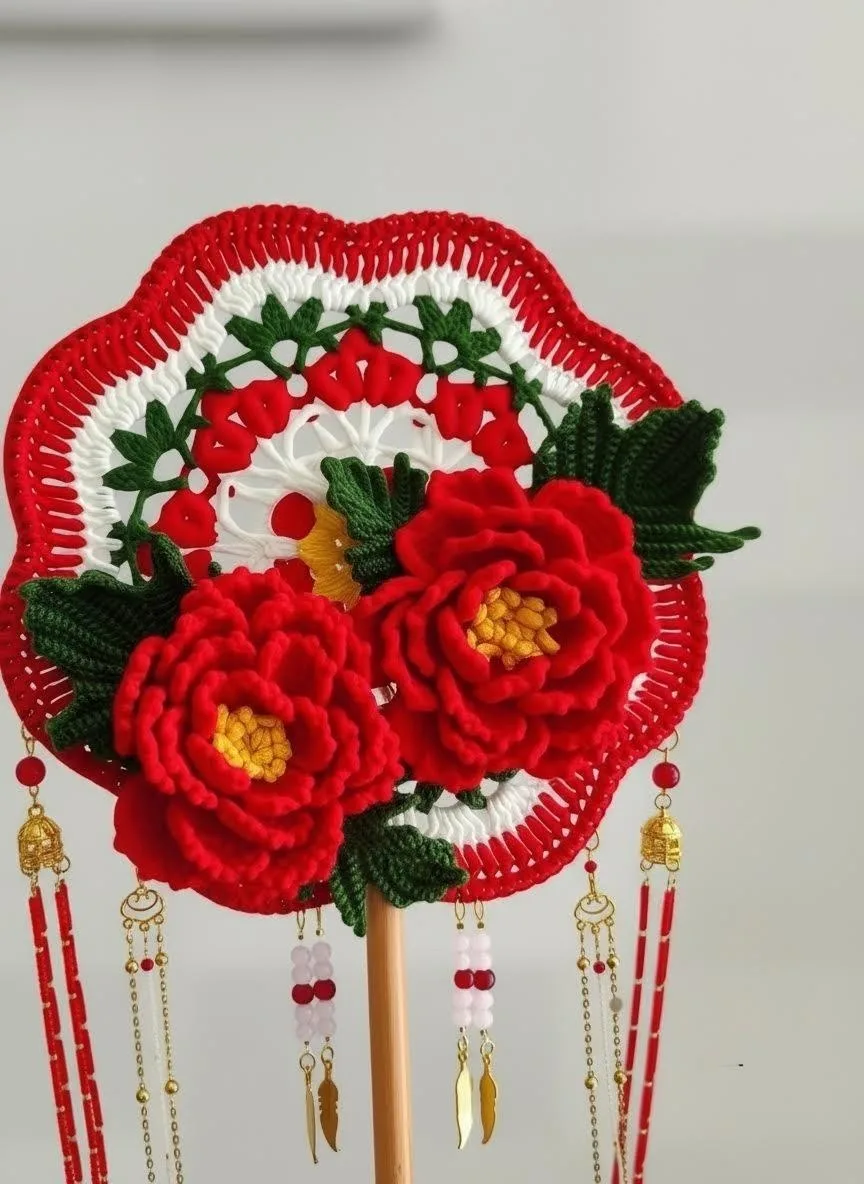 Crochet peony flower fan with tassels close up