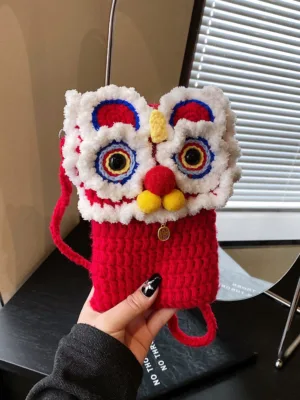 red lion dance crochet phone bag hand held front close up