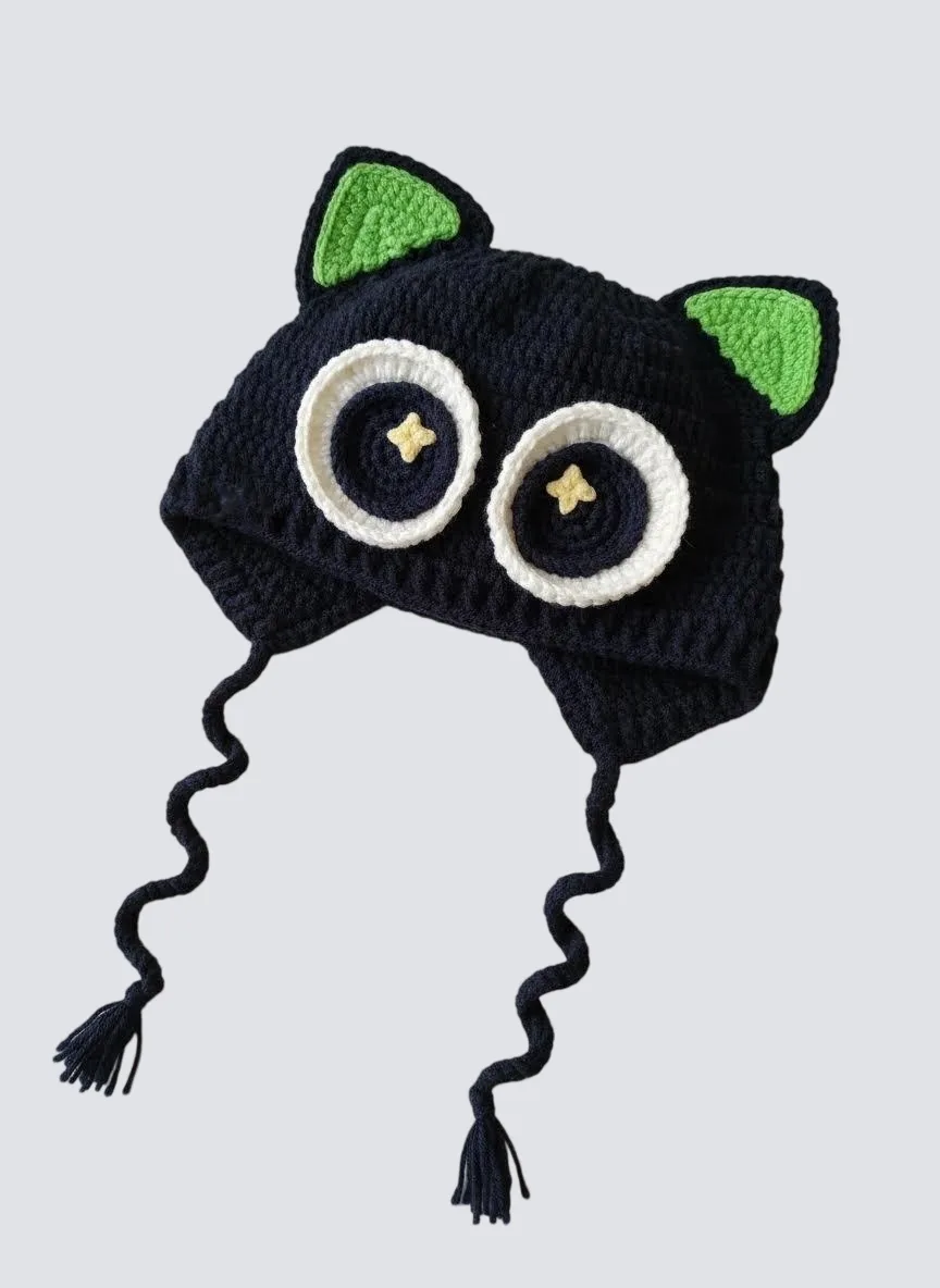 black cat ear crochet baby hat with green ears