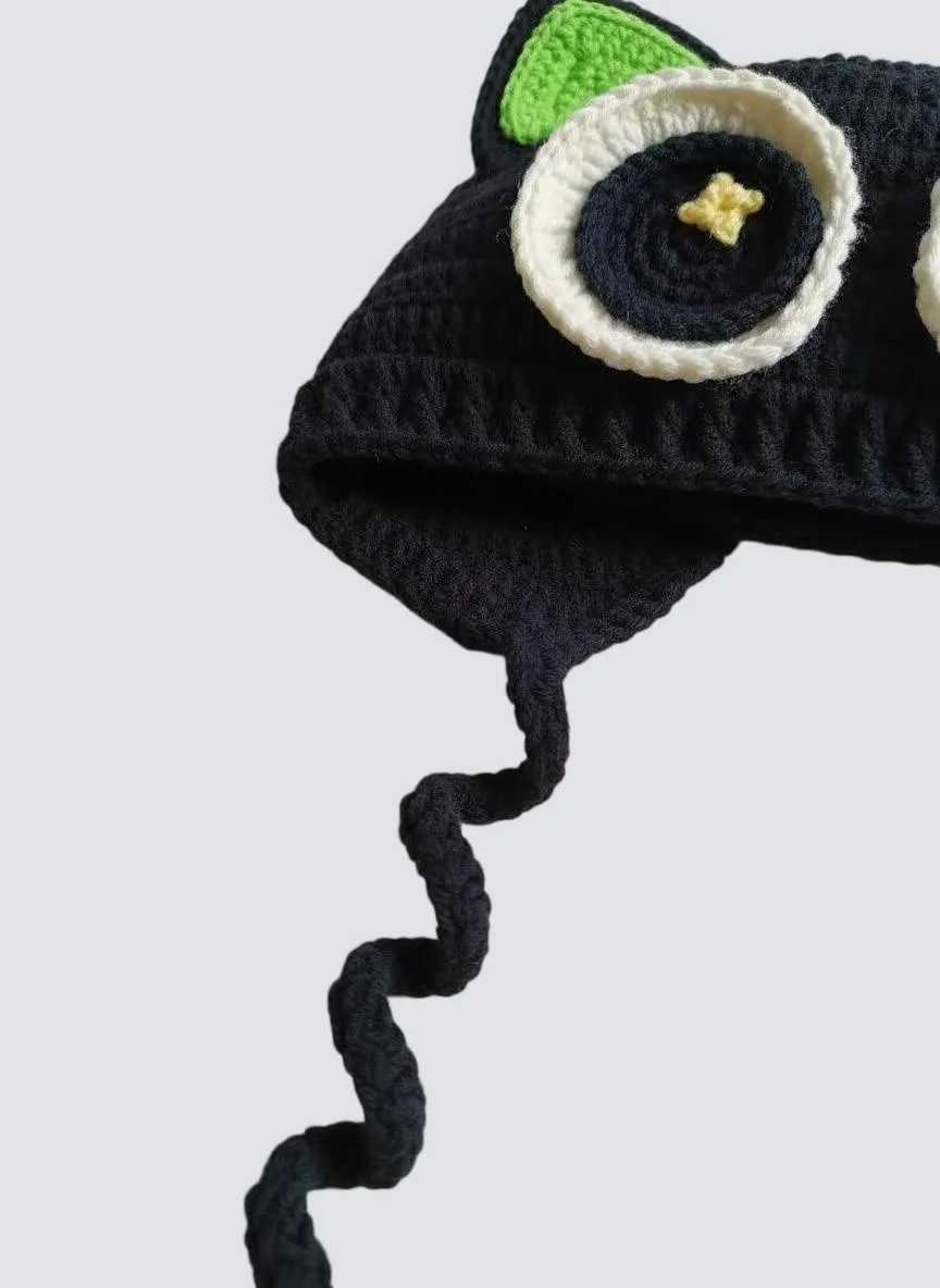 close up of fluffy black cat ear hat texture