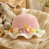 blush meadow floral ruffle sun hat lifestyle scene