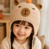 cream bear pumpkin earflap hat hanging display