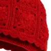 crimson bobble earflap beanie close up detail