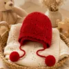 crimson bobble earflap beanie lifestyle scene