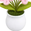 pink flower white pot ornament close up detail