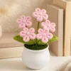 pink flower white pot ornament detail view