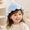 sky bunny ruffle sun hat hanging display